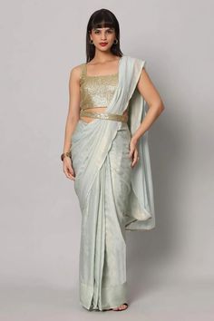 Meera Sea Blue & Gold Shimmer Georgette One Minute Saree Elegant Fitted Pre-draped Saree For Summer, Blue Draped Fitted Choli, Blue Fitted Draped Choli, Fitted Draped Blue Choli, Elegant Summer Silk Pre-draped Saree, Glamorous Blue Pre-draped Saree, Elegant Draped Blue Sets, Elegant Blue Draped Sets, Elegant Draped Blue Lehenga