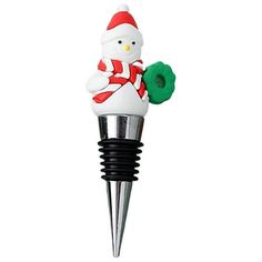 a snowman bottle stopper with a candy cane in the shape of a snowman