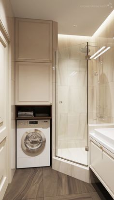 a washer and dryer in a small bathroom