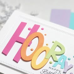 a close up of a birthday card with the word hooray written on it