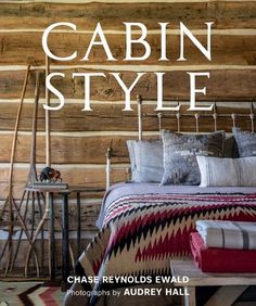 the cover of cabin style by chase revvold's ewald, including pillows and blankets