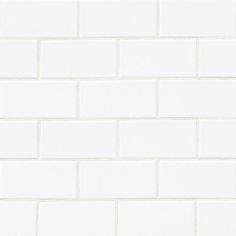 a white brick wall is shown in this image