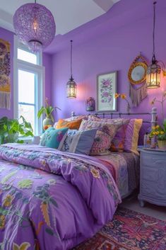 a bedroom with purple walls and colorful bedding