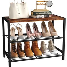 there are many pairs of shoes that are on the shelf next to books and purses