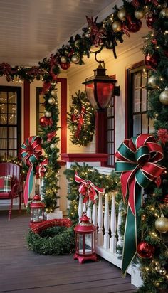 a porch decorated for christmas with wreaths and lights