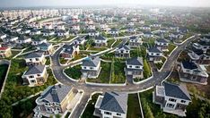 an aerial view of many houses and roads