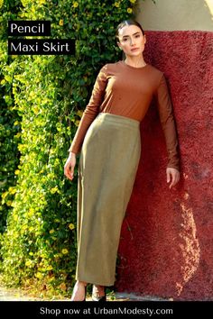 Elevate your skirt game with The Olive Green Suede Pencil Maxi Skirt. Made with premium faux suede fabric that's smooth, lightweight but not see through. Features a concealed back zipper closure and a pleated kickback to make walking a breeze. Olive Green Skirt, Maxi Pencil Skirt, Modest Maxi, Maxi Cardigan, Faux Suede Fabric, Suede Fabric, Green Suede, Professional Outfits, Seasonal Fashion