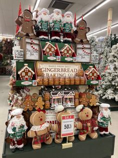 christmas gingerbreads and cookies are on display for sale in the store's department