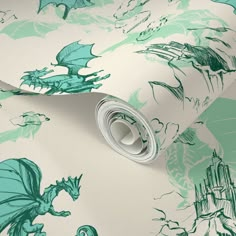 a green and white wallpaper with dragon designs