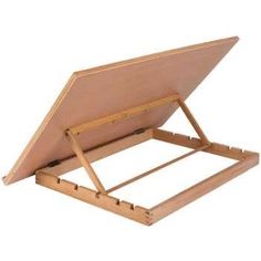 a wooden stand with a laptop on it