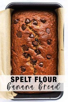 a loaf of banana bread with chocolate chips in it and the words, spelt flour