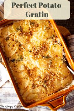 a casserole dish with potatoes and parmesan cheese