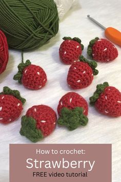 crocheted strawberries and yarn with the text how to crochet strawberry