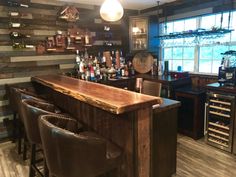 a bar with stools in front of it