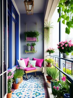 the balcony is decorated with potted plants and colorful pillows, along with hanging planters