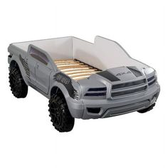 a toy truck bed with wheels on it