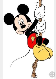 mickey mouse hanging on to a rope