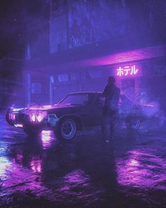 a person standing in front of a car on a rainy street at night with neon lights