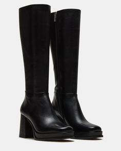 Crafted for ultimate sophistication, these knee-high boots boast a sleek square toe and sturdy block heel for effortless style. Elevate your wardrobe with the MYSTERY platform boot. 3.25 inch heel height 1 inch platform Size 6 measurements: 14 inch shaft circumference, 14.25 inch shaft height Size 8 measurements: 15.5 inch shaft circumference, 15 inch shaft height Size 10 measurements: 16 inch shaft circumference, 15.5 inch shaft height Leather upper material Textile and synthetic lining Synthet Platform Boots Women, Platform Block Heels, Leather Block Heels, Platform Boots, Knee High Boots, High Boots, Women's Boots, Effortless Style, Knee High