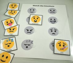 a bunch of emoticions that are on top of a sheet of white paper