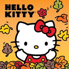 an image of hello kitty with autumn leaves