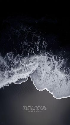 an aerial view of the ocean and waves with a quote written in white on it