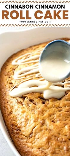 a spoon drizzling white sauce on top of a cake in a pan