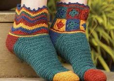 the legs of a woman wearing colorful socks