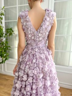 Discover elegance redefined with our enchanting floor-length dress, designed to captivate and charm at every turn. Bathed in a soft lavender hue, this masterpiece is crafted from high-quality, embroidered lace fabric that boasts a luxurious three-dimensional texture, inviting blooming lace patterns to dance across its surface. The dress features a flattering V-neckline, complemented by a wrap top that gently hugs your figure, leading down to a cinched waist and flowing into a graceful A-line sil Barbie Vibes, Dreamy Gowns, Churidar Designs, Beautiful Long Dresses, Soft Lavender, Embroidered Lace Fabric, Party Clothes