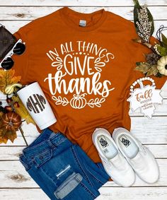 This In All Things Give Thanks Graphic Tee Shirt will be your go to shirt this fall! A must have for every Thanksgiving feast! Perfect for dressing up or down! You can wear this to any fall festivity throughout the season!

* 6 oz., 100% preshrunk cotton * Classic fit * Seamless double needle 7/8" collar * Taped neck and shoulders * Double needle sleeve and bottom hems * Quarter-turned to eliminate center crease Thanksgiving Tshirt Ideas, Fall Shirts Vinyl, Fall Tshirt Designs, Thanksgiving Tshirts, In All Things Give Thanks, Thanksgiving Shirts For Women, Fall Tee Shirts, Fall Tees, Thanksgiving Outfits