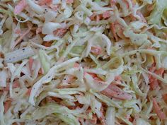 a close up view of coleslaw and carrots