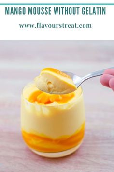 mango mousse without gelatin in a small glass bowl with a spoon inside