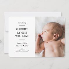 a birth announcement card with a baby's photo