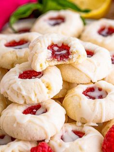 raspberry lemon shortbreads are piled on top of each other