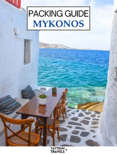 a table and chairs with the words packing guide mykonos in front of it