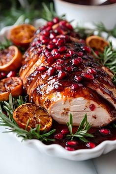 Roast chicken garnished with pomegranate seeds, fresh rosemary, and grilled orange slices on a white platter. Pomegranate Glaze, Turkey Glaze, Turkey Breast Recipe, Decorações Com Comidas, Xmas Dinner, Turkey Dishes, Pork Loin Roast