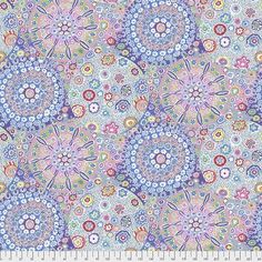 a blue and pink flowered pattern on fabric