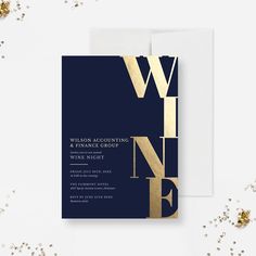 a blue and gold wedding card with the word winner written on it, next to some confetti