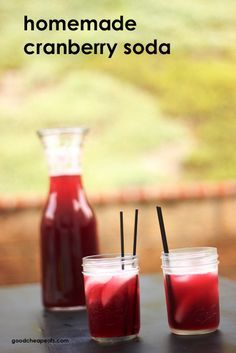 homemade cranberry soda in two glasses with straws