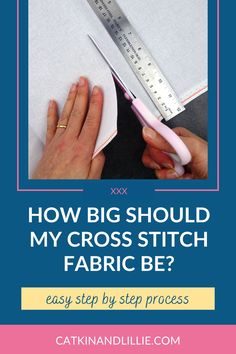 a person is cutting fabric with a large ruler and pink scissors in front of them