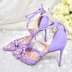 Step into enchantment with these purple lace-up heeled wedding shoes adorned with Butterfly Floral Embroidery. A whimsical blend of elegance and charm, perfect for your special day. Color: Purple Heel Type: Stiletto heel Heel Height: 4'' / 100 mm approx Product measurements were taken using size 8. Please note that measurements may vary by size. Toe: Pointed toe Butterfly floral embroidery design Lace-up ankle strap design Handcrafted US sizing. Fits true to size. Lilac Sandals, Lilac Heels, Quinceanera Shoes, Butterflies Wedding, Purple Wedding Shoes, Wedding Shoes For Bride, Shoes For Bride, Perfect Wedding Shoes, Purple Heels