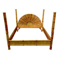 a bamboo bed frame with fan shaped headboard