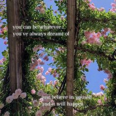 two wooden poles with pink flowers on them and the words you can be whatever you've always dream of just believe in yourself and at will happen