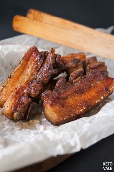 fried pork belly with ketchup on the side and text overlay reading chicharon crispy fried pork belly low carb keto