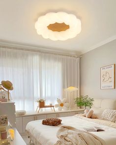 a bedroom with a bed, desk and lamp in it's centerpieces