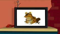 a cartoon frog sitting on top of a table next to a phone and a brick wall