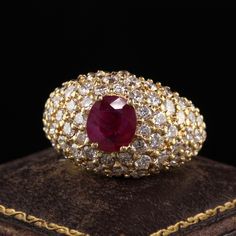 Beautiful Vintage Estate 18K Yellow Gold Burma Ruby and Diamond Ring - GIA. This beautiful ring is crafted in 18k yellow gold. The center holds a GIA certified Burma ruby with white diamonds surrounding it. It has the diamond and ruby weight engraved on the inside. Item #R1318 Metal: 18K Yellow Gold Weight: 10.7 Grams Size: 7 1/4 Diamonds: 2.36 cts Color: H Clarity: VS2 - SI1 Ruby: 1.60 cts Burma - GIA # 1363858095 Measurements: Top of the ring measures 14.48 mm wide and band measures 5.27 mm wi Watch Cufflinks, Ruby And Diamond Ring, Ruby Diamond Rings, Birthstone Colors, Ruby Diamond, Beautiful Ring, Watch Necklace, White Diamonds, Antique Rings