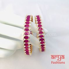 2.6 size Ruby/Green Emerald and CZ Stones Bangles Features: Made in Brass with 22 Karat Gold polish Pair of 2 Bangles Thickness: Approx. 0.35 Inches Available in size 2.6 Stone Bangles, Bangles Making, Stone Bangle, Ruby Stone, Gold Polish, Green Emerald, Cz Stone, Emerald Green