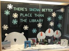 there's snow better place than the library sign in the window with polar bears