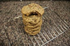 a stack of cookies sitting on top of a metal rack